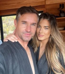 Couple in matching robes.