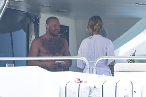 Conor McGregor and Dee Devlin on a yacht.