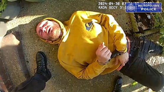 Handout screengrab of a suspect's arrest.