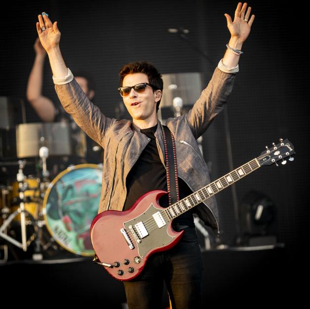 Roddy Scott playing guitar at the TRNSMT Festival.