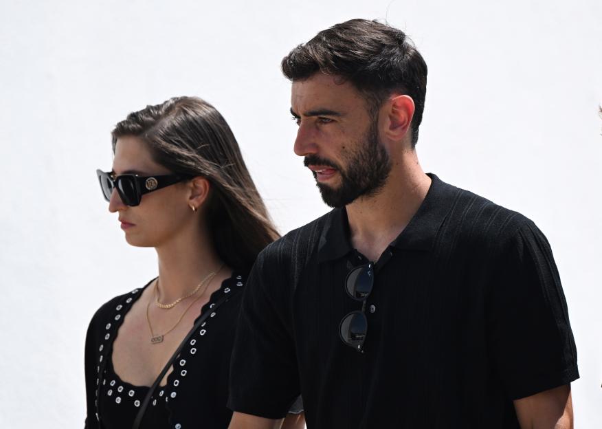 Bruno Fernandes at a funeral ceremony.