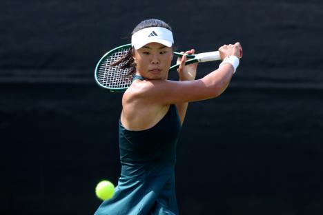 NOTTINGHAM, ENGLAND - JUNE 17: Mimi Xu of Great Britain plays a backhand against Katie Volynets of United States during the Women's Singles Third Round match on day 4 of the Lexus Nottingham Open at the Lexus Nottingham Tennis Centre on June 17, 2025 in Nottingham, England. (Photo by Nathan Stirk/Getty Images for LTA)