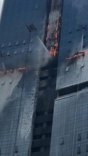 Tethered drones extinguishing a high-rise fire.
