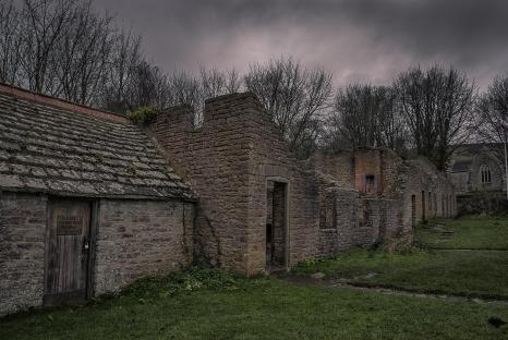 Ruins of stone buildings in Tyneham, Dorset.