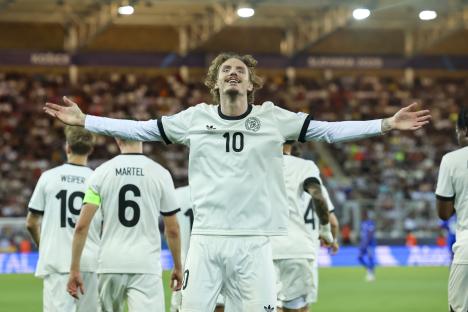 Nick Woltemade of Germany celebrating after scoring a goal.