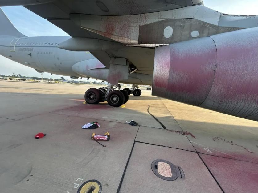 Paint-splattered military aircraft engine at RAF Brize Norton after a break-in.