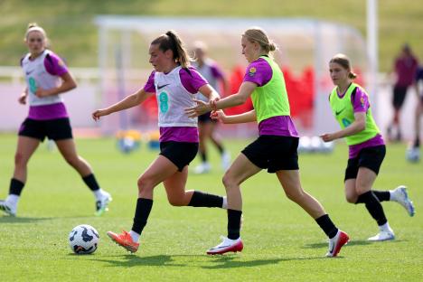 Ella Toone and Aggie Beever-Jones of the England women's national football team during a training session.
