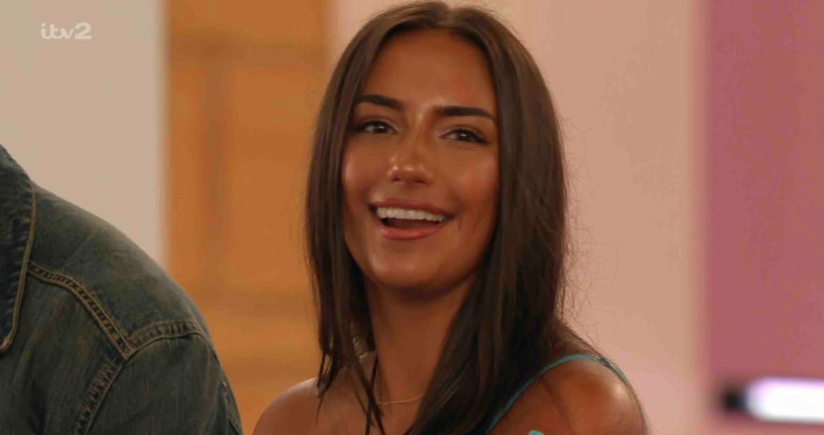 Meg from Love Island smiling.