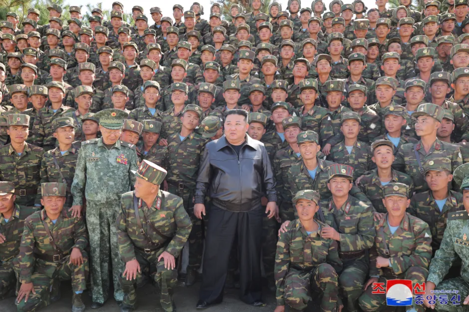 Kim Jong-un with North Korean soldiers.