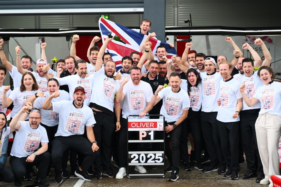 Oliver Rowland's Formula E World Championship winning team celebrating.