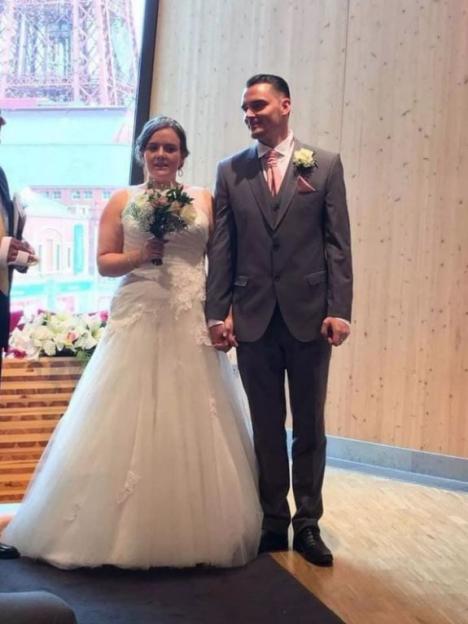 A bride and groom at their wedding.