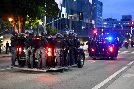 LOS ANGELES, CALIFORNIA - JUNE 11: Police arrest dozens of protesters during an anti-ICE (Immigration and Customs Enforcement) protest near the City Hall in Los Angeles, California, United States on June 11, 2025 over immigration raids. (Photo by Tayfun Coskun/Anadolu via Getty Images)