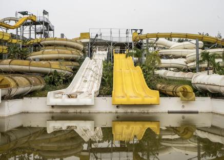 Abandoned water park with water slides.