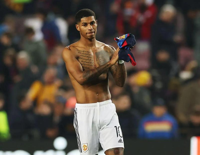 Marcus Rashford applauding fans.