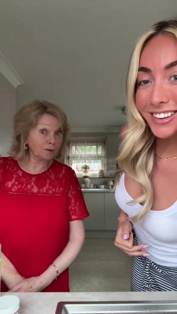 A woman and her grandmother discuss a skincare routine.