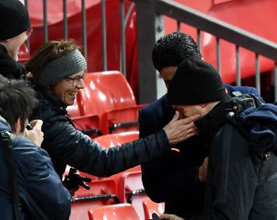 Parents of Thomas Tuchel speaking with Nasser al-Khelaifi at Old Trafford.