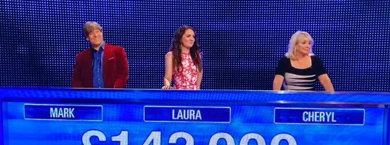 Three contestants, Mark, Laura, and Cheryl, at a game show podium with £142,000 displayed.