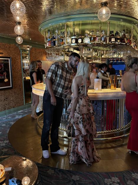 Shea and Sacha at a bar.