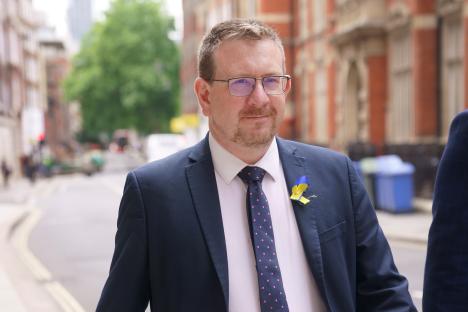 Photo of Andrew Gwynne, Labour MP, wearing a suit.