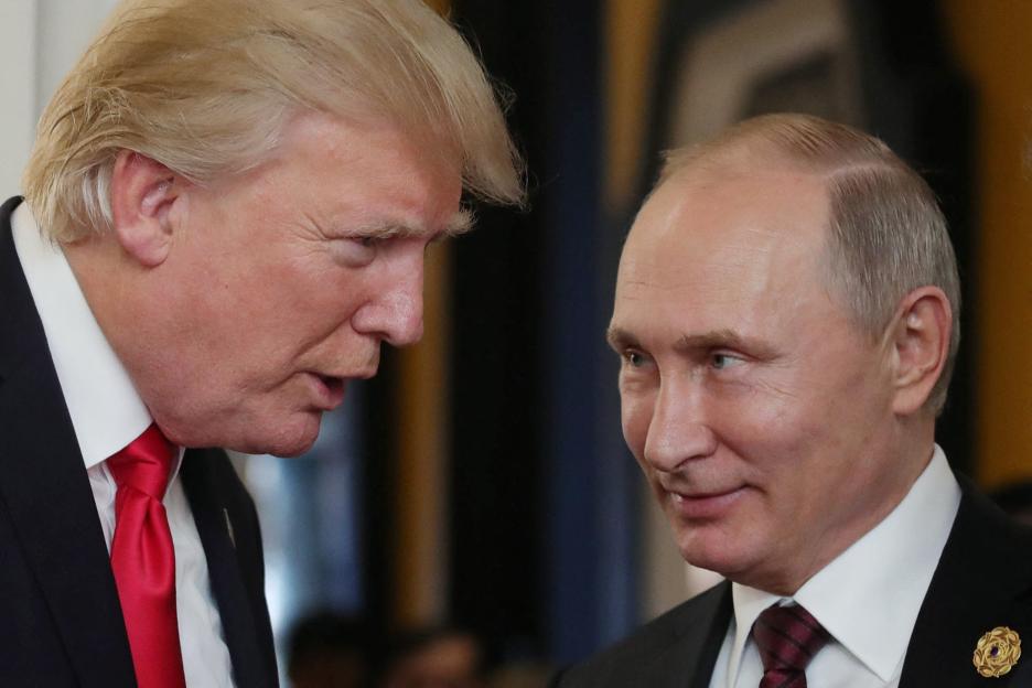 Presidents Trump and Putin in conversation.