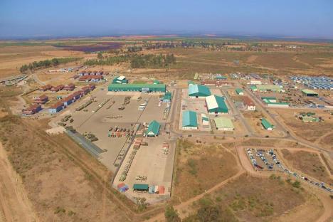 Aerial view of Nyati Barracks, a British Army facility in Kenya, showing buildings, vehicles, and equipment.