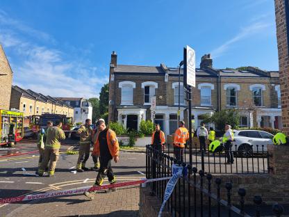 Emergency responders at the scene of a suspected gas explosion.