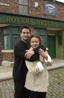 SUNPIC NEIL JONES. EX-EASTENDERS STARS NADIA SAWALHA AND MARC BANNERMAN ON CORONATION STREET SET