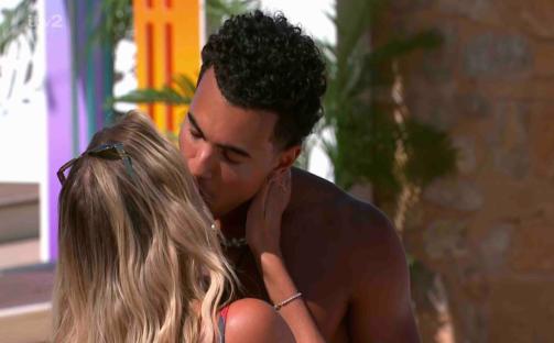 Couple kissing on Love Island.
