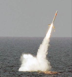 Tomahawk cruise missile launching from a submarine.