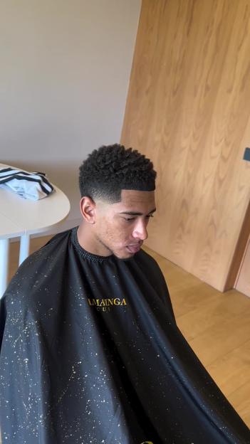 Man getting a haircut.