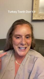 Woman sharing her negative experience with Turkey teeth.