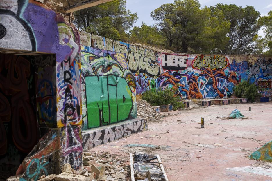 Graffiti-covered ruins of a former Ibiza superclub.