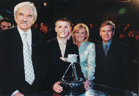 Michael Owen with BBC Sport presenters receiving the BBC Sports Personality of the Year Award.