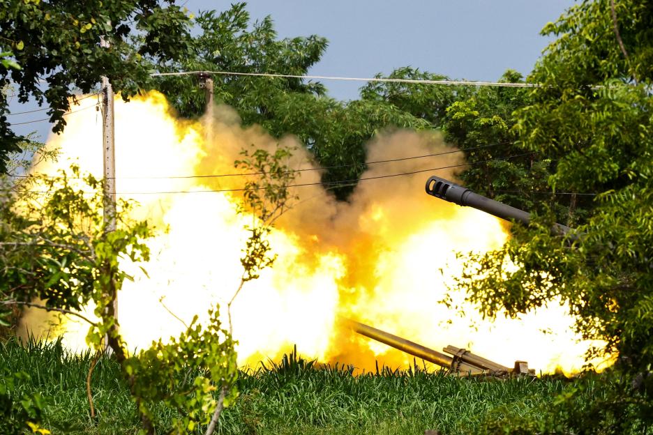 Thai artillery unit firing.