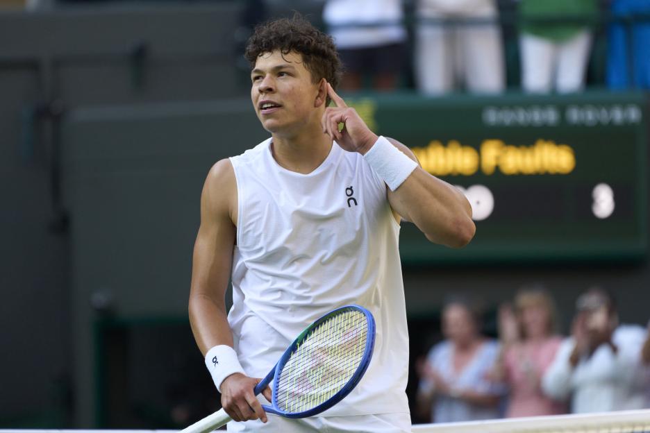 Ben Shelton of the United States celebrates a tennis match win.