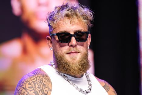 Jake Paul wearing sunglasses and a necklace.