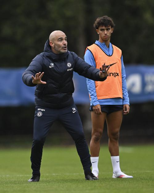 Chelsea head coach Enzo Maresca instructing Joao Felix during training.