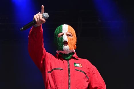DJ Provaà of Kneecap performing at Glastonbury Festival 2025.