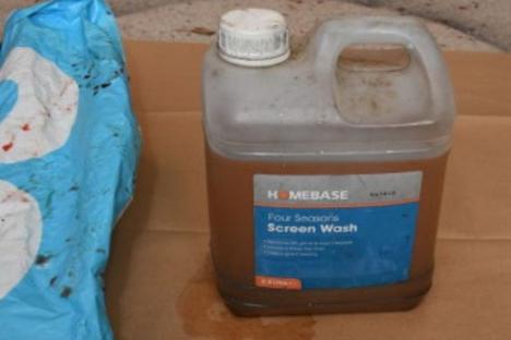 Fuel container found in suspect's possession.
