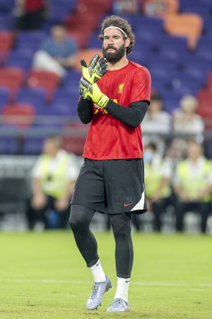 Alisson Becker, Liverpool goalkeeper, warming up.