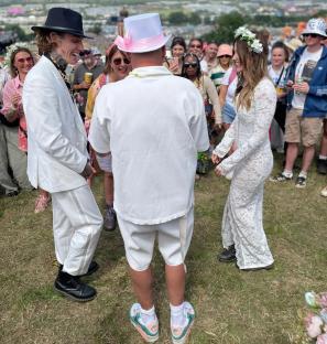 Wedding ceremony at Glastonbury Festival with 500 guests.