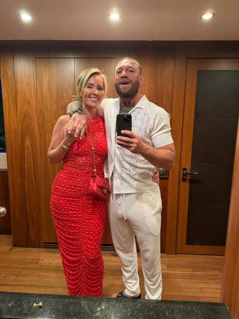 Conor McGregor and Dee Devlin posing for a selfie.