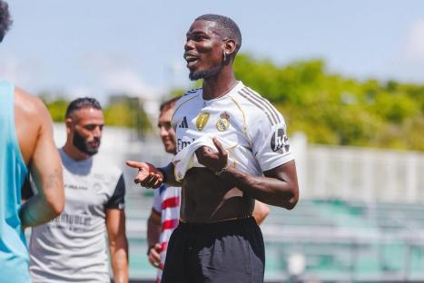 Paul Pogba in a Real Madrid training shirt.