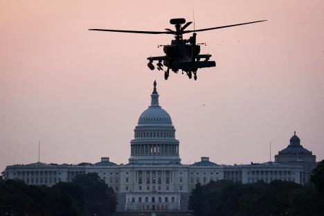 AH-64 Apache helicopter over the U.S. Capitol.