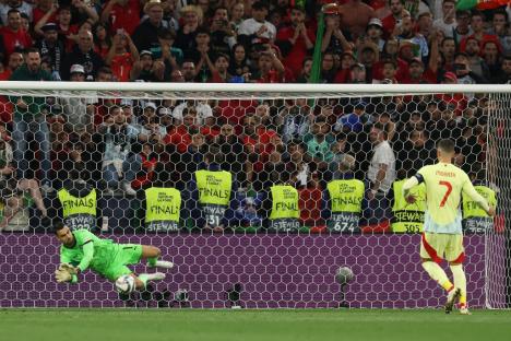 MUNICH, GERMANY - JUNE 08: Diogo Costa of Portugal saves a penalty taken by Alvaro Morata of Spain during a penalty shootout during the UEFA Nations League 2025 final match between Portugal and Spain at Munich Football Arena on June 08, 2025 in Munich, Germany. (Photo by Alexander Hassenstein/Getty Images)