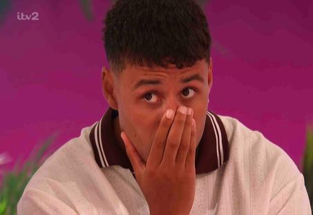 ITV2 Love Island: Islander at the fire pit.