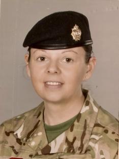 Portrait of AJ Clark in her army uniform.