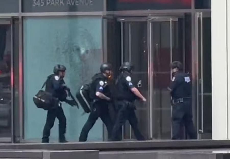 Police officers responding to a shooting in New York City.