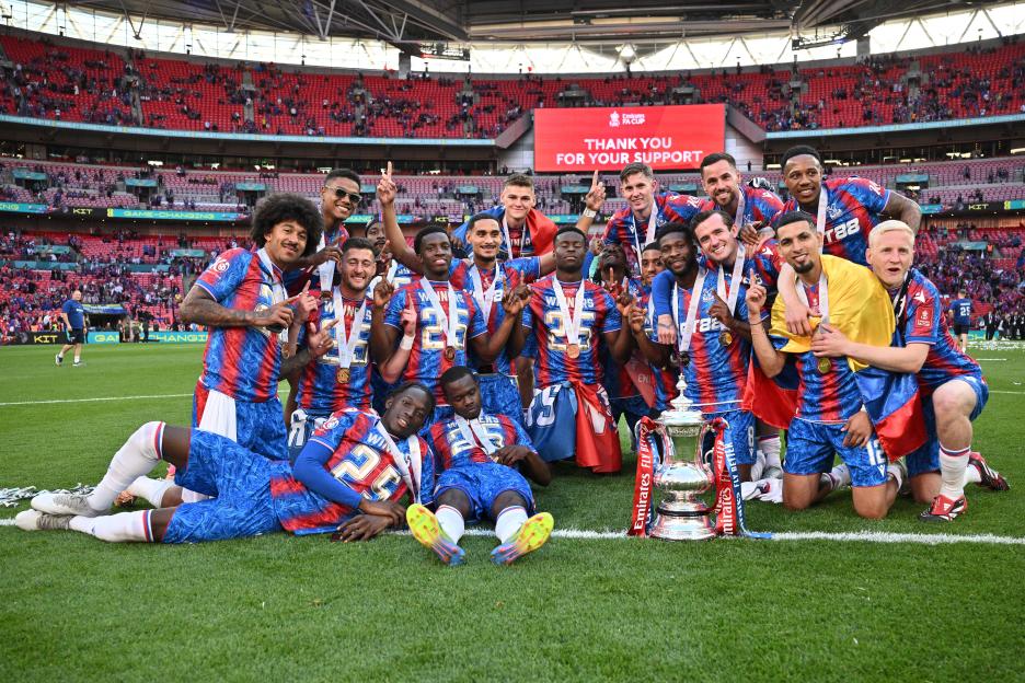 Crystal Palace F.C. team celebrating with the FA Cup trophy.