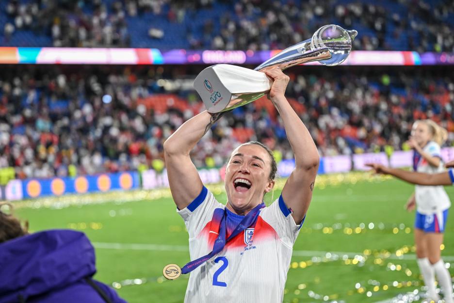 Lucy Bronze of England celebrates with the UEFA Women's Euro 2025 trophy.